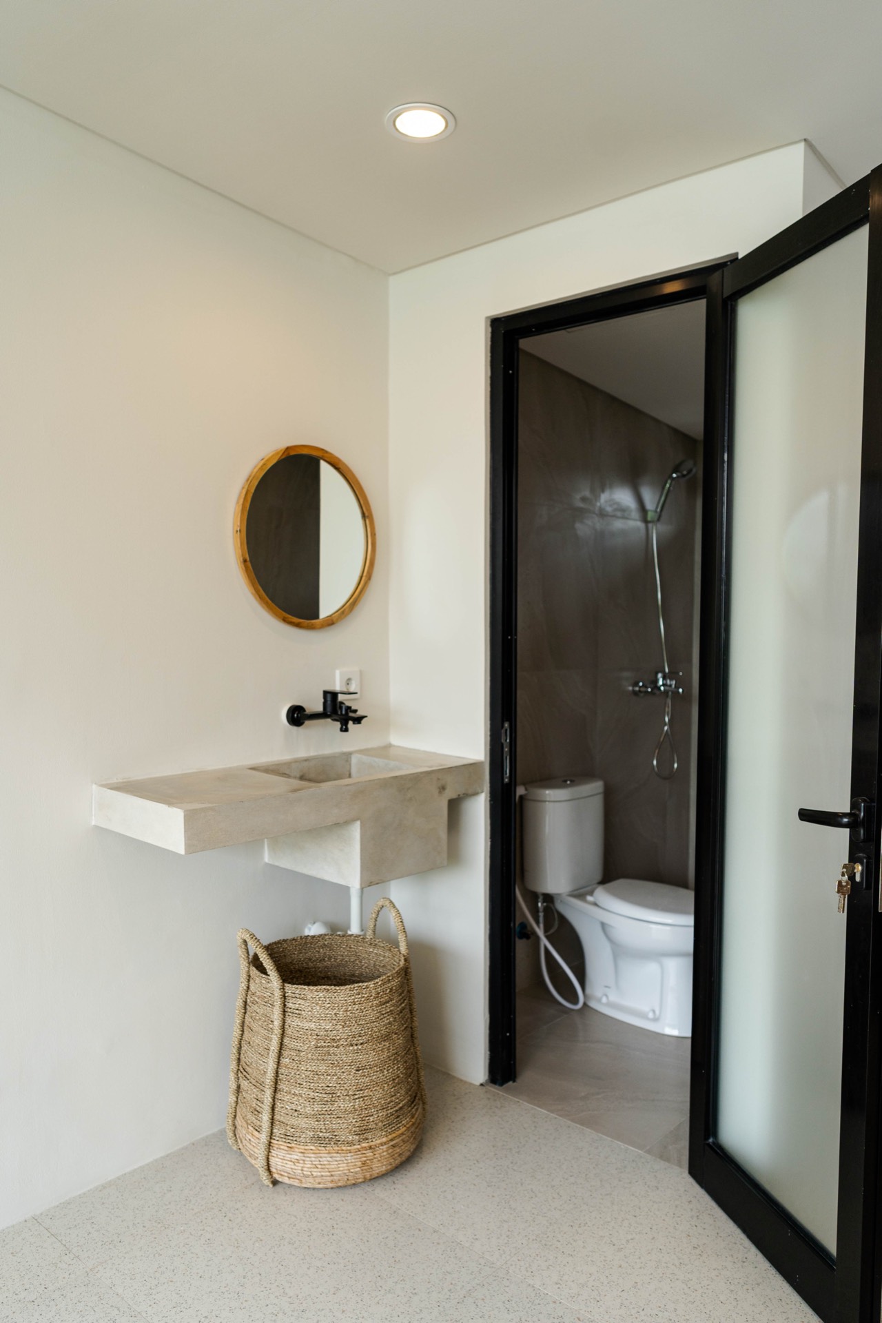 Concrete sink and ensuite shower