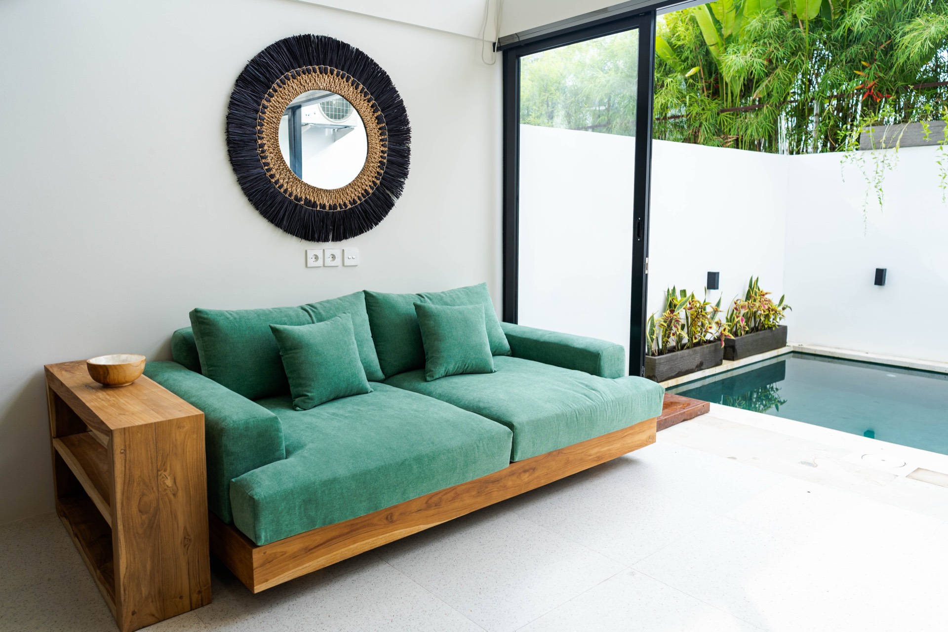 Sofa view through to pool deck